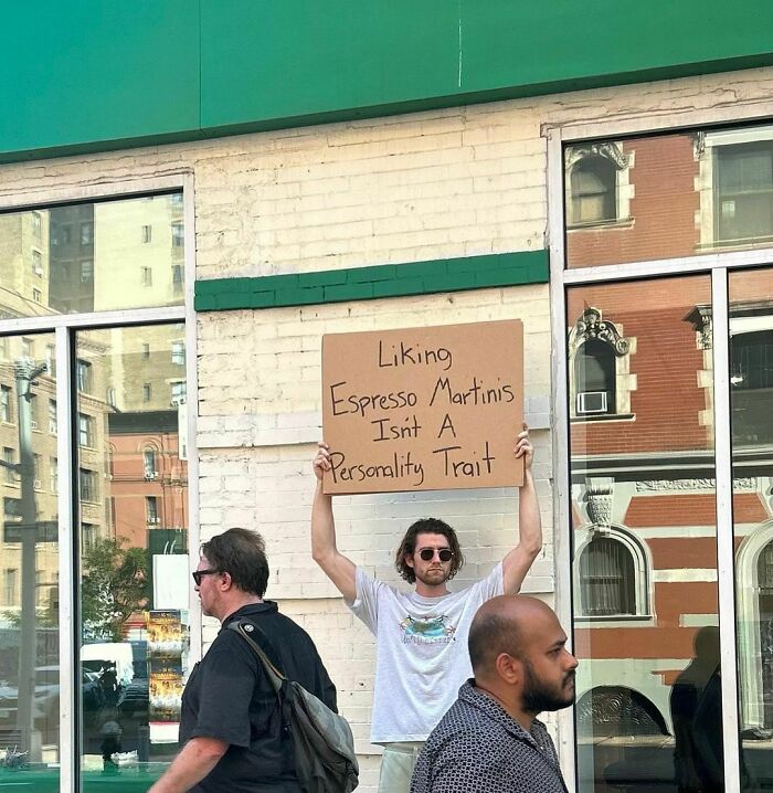 Clever-Dude-With-Sign-Protesting-Annoying-Things