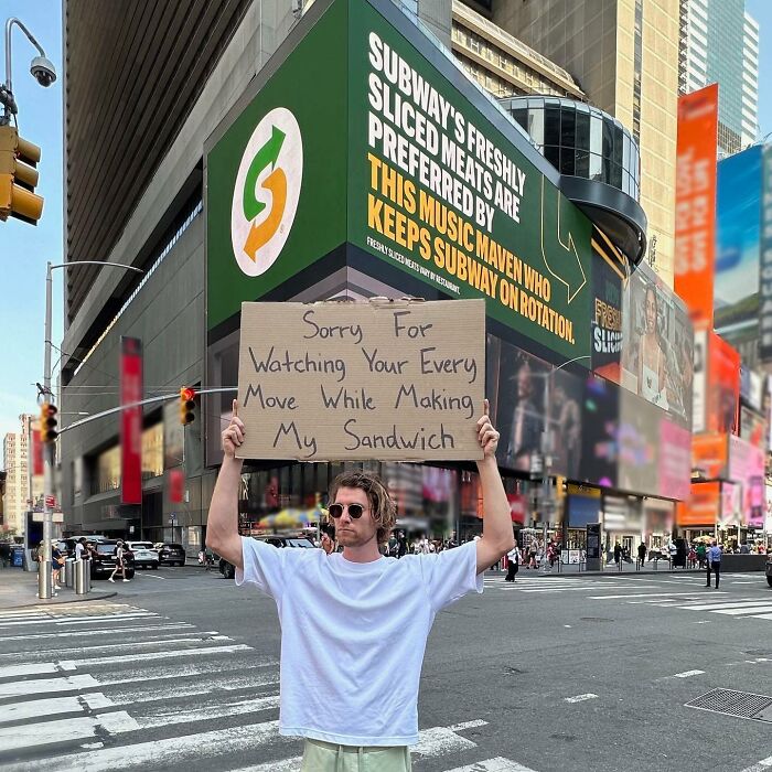 Clever-Dude-With-Sign-Protesting-Annoying-Things