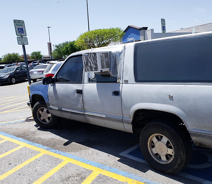 Window Unit In SUV To Stay Cool In Texas Heat