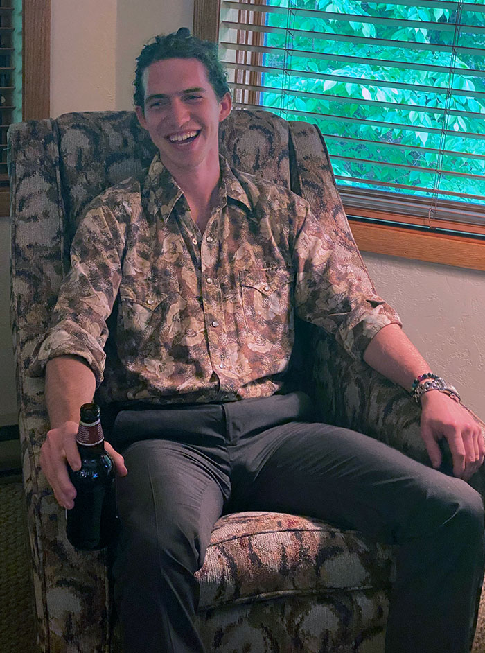 Staying At A Hotel For A Wedding In Wisconsin, And My Friend's Shirt Blends In With The Furniture