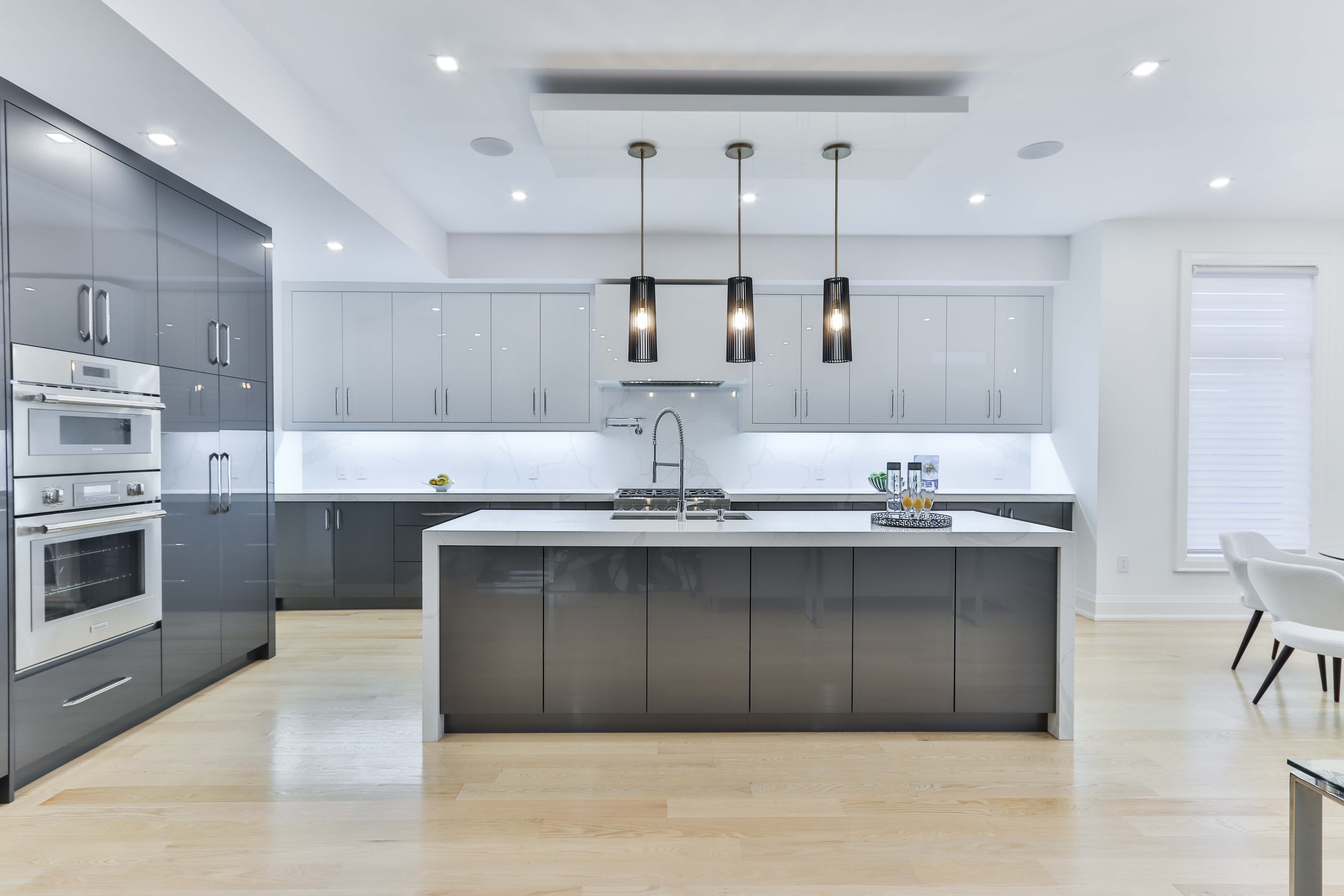 This glam black and white kitchen balances family practicality