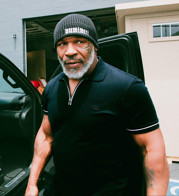 Mike Tyson in black beanie and shirt 