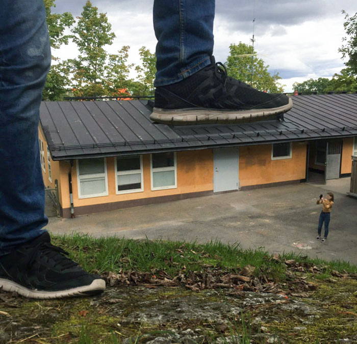 A Guy About To Demolish A Building With His Foot