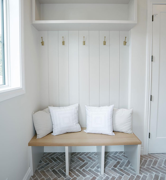 Bright mudroom window seat