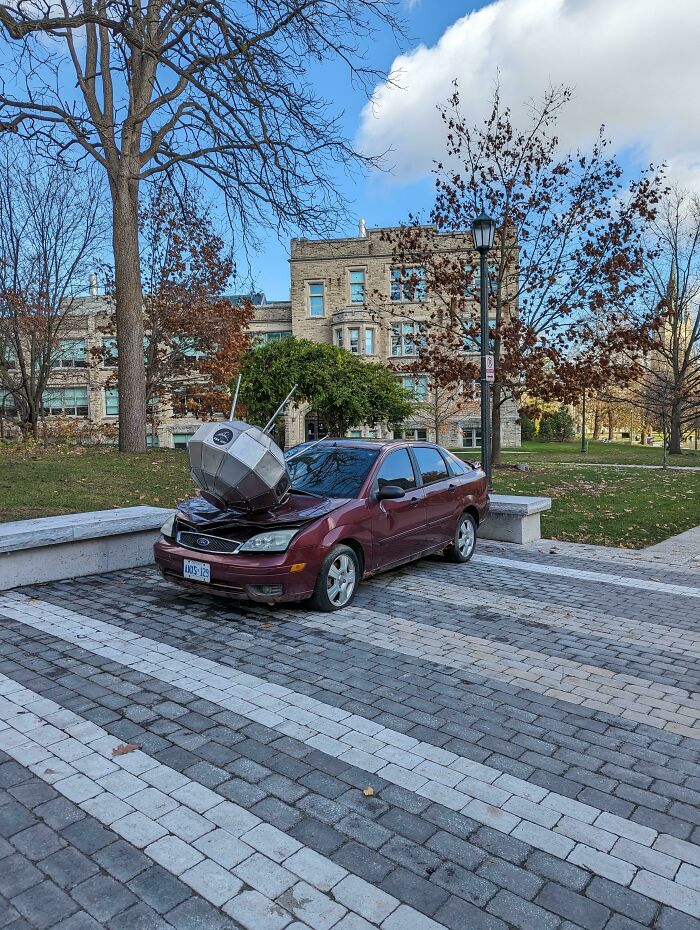 There's A Satellite Parked On A Car At My University Campus