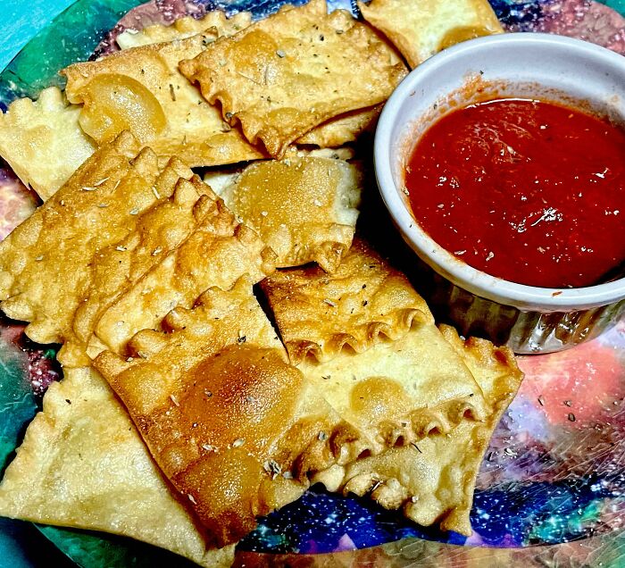 I Had Some Leftover Lasagna Trimmings, So I Fried Them, Seasoned Them With Salt, Garlic, And Italian Seasoning. Then Served With Warm Sauce On The Side. A Tasty Snack To Eat While Waiting For The Actual Lasagna To Cook!