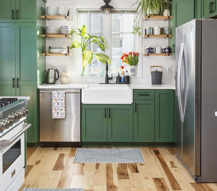 Bold, Small Kitchen with Green Cabinets and Slate Appliances