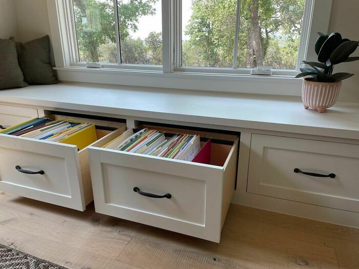 Storage space in a bright window nook 