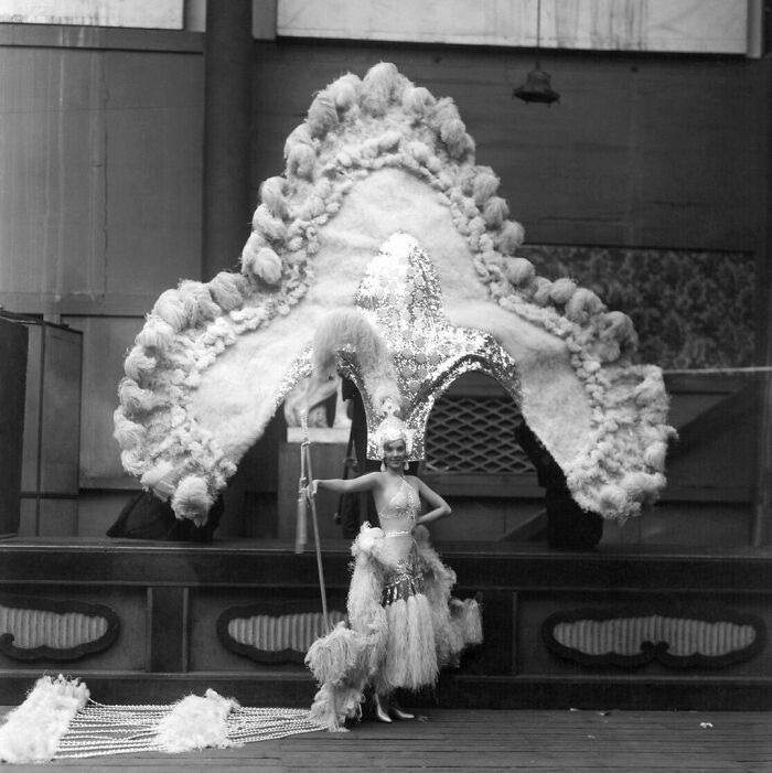 British Actress Jessie Matthews Supporting An Enormous Headdress For The Revue 'Evergreen' (1934)