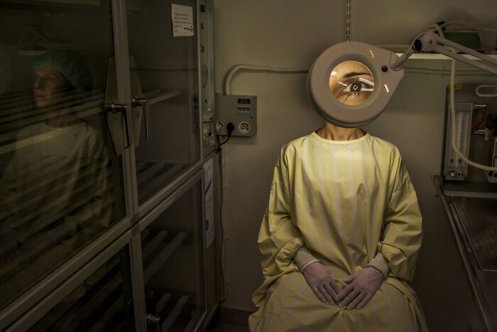 A Photograph Of A Woman At An Optician