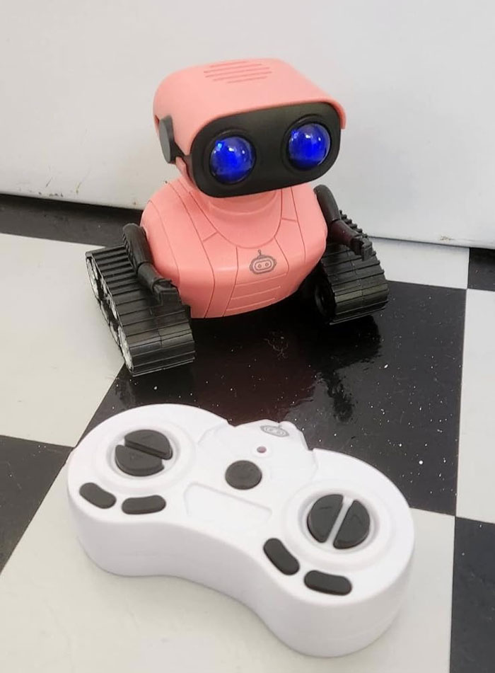 Robot Toy: With LED eyes, smart voice, and dancing abilities, perfect for stimulating cognition and imagination in children for hours of interactive fun!