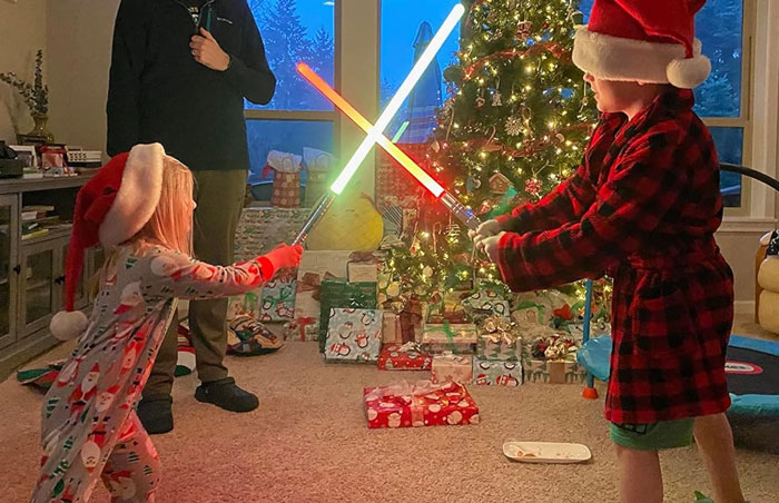 FX Lightsaber: Engage in realistic intergalactic combat with this high-quality, USB rechargeable lightsaber toy, perfect as a holiday gift for your young Star Wars fans.