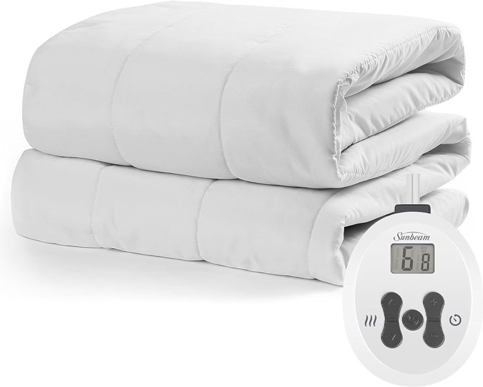 Sunbeam Restful Quilted Electric Heated Mattress Pad: For cozying up your bed during winter nights, with customizable heat settings and easy maintenance for ultimate winter comfort.