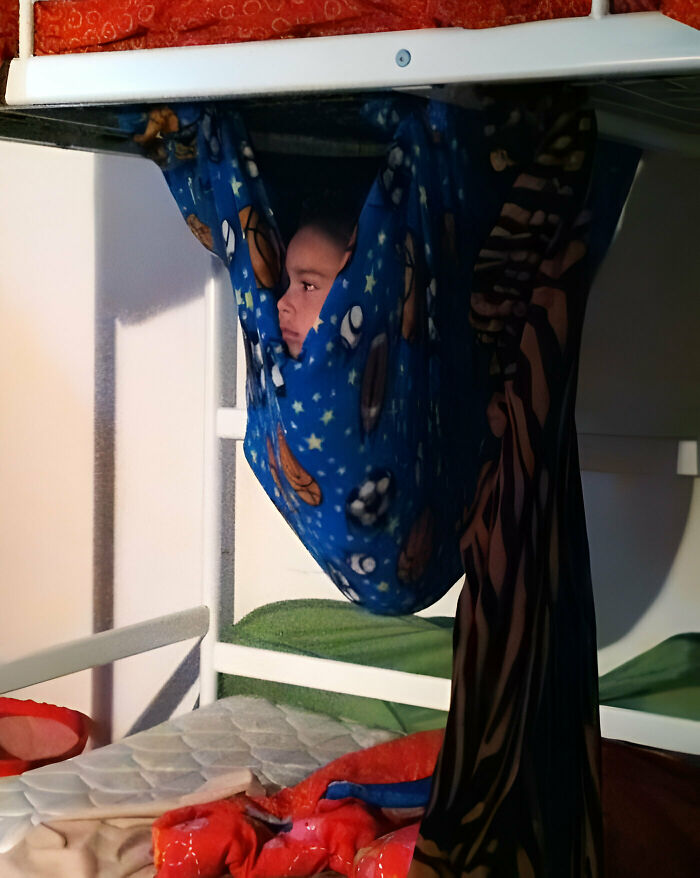 This Kid Is A Genius. Someone's Brother Made A Hammock And Has Been Watching TV Like This