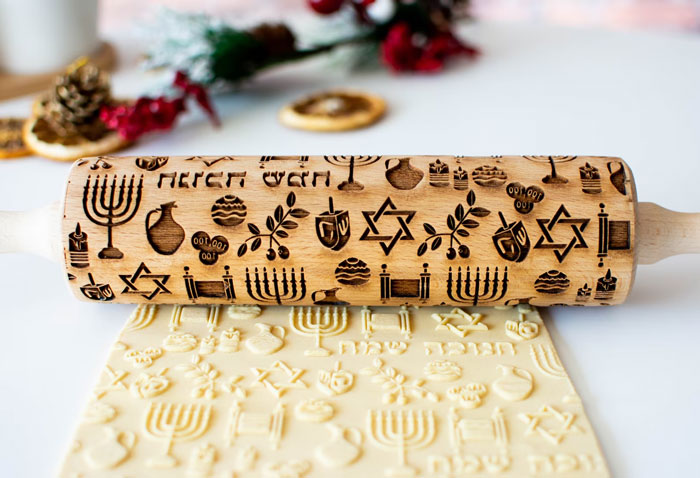 Embossing Rolling Pin: Made from natural beech wood with a touch of artisan precision — perfect for mixing up traditional Hanukkah cookies and pastries with a twist!