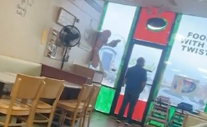 Heartbreaking Photo Of Restaurant Owner Looking Out The Window Goes Viral, Attracts Dozens Of Customers