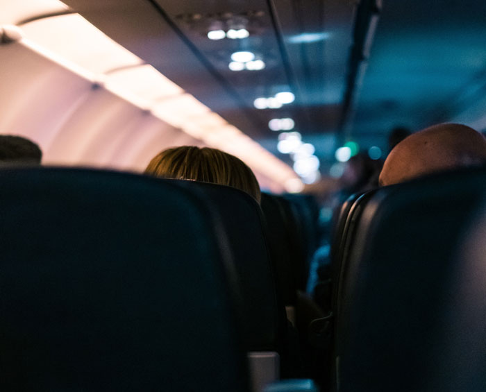 Plane Passenger 'Turns’ Mute For The Flight When His Seatmate Misinterprets Why He Can’t Speak