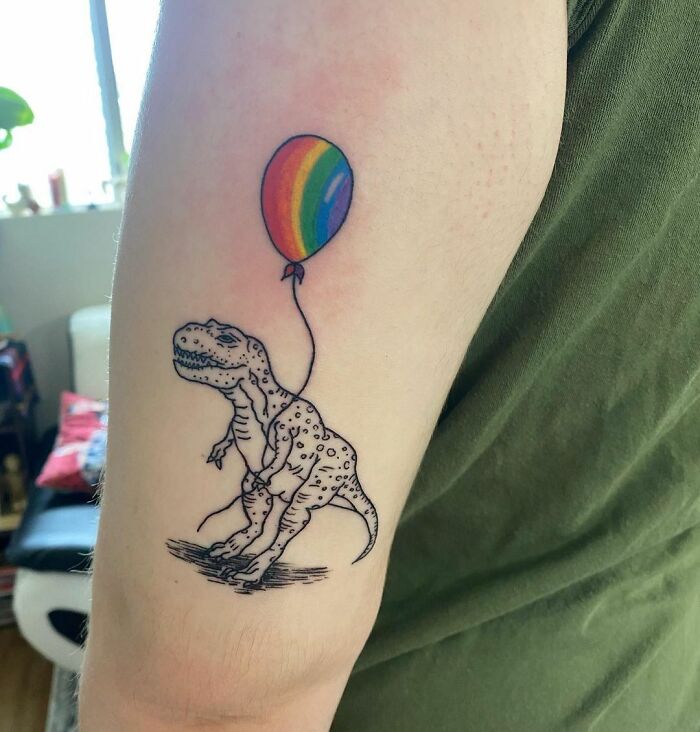 A Cute T-Rex Tattoo