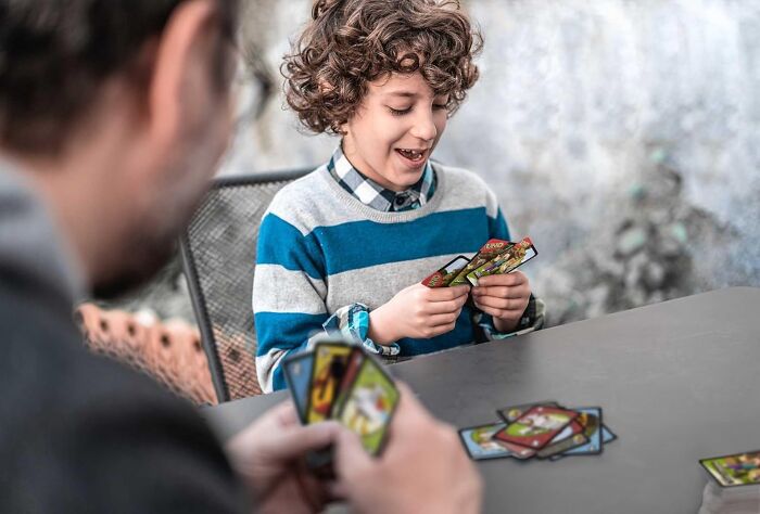 Immerse Yourself In Fun With The Mattel Games UNO Minecraft Card Game - Videogame-Themed Collectors Deck Featuring 112 Cards With Character Images!