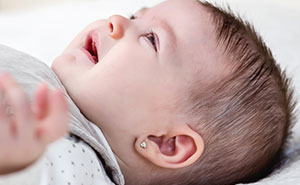 6-Month-Old Baby Taken To Doctor After Her Grandma Secretly Pierced Her Ears