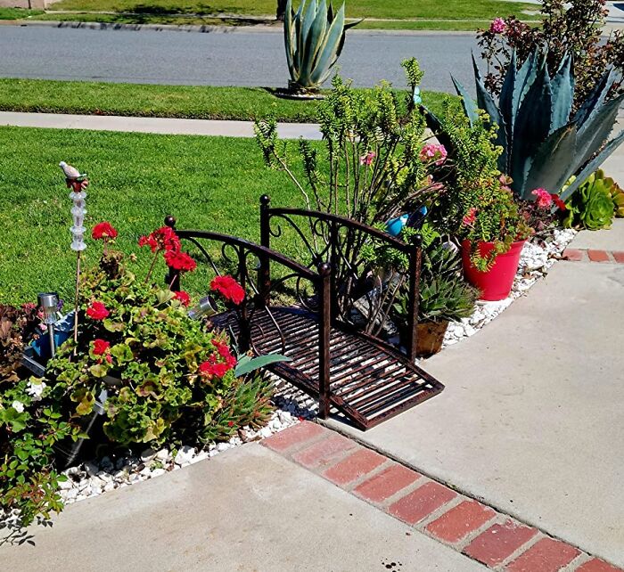 Elegant Escape: Outsunny's Floral Metal Bridge Enhances Your Garden's Charm!