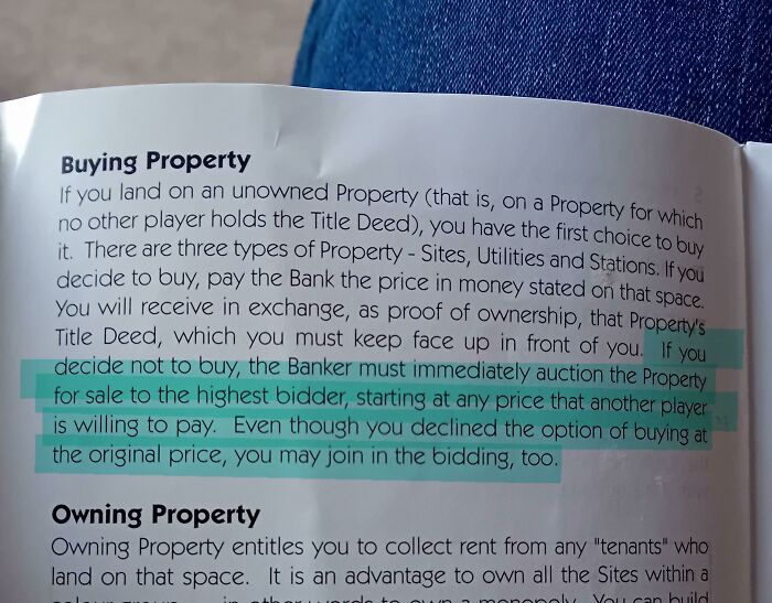 UK humor highlighted in a board game rule about auctioning property, with text partially highlighted in blue.