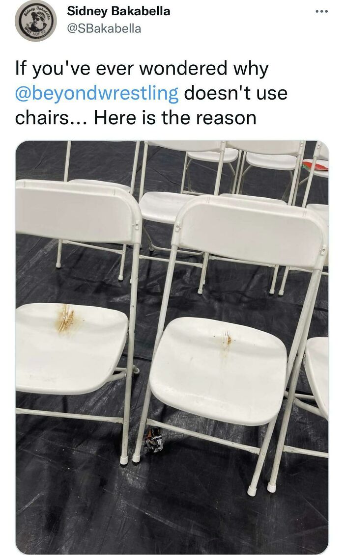 White folding chairs with forks sticking out, mirroring unexpected and humorous situations.