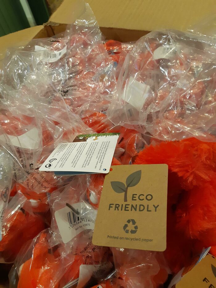 Excessive plastic packaging labeled "eco-friendly," highlighting misleading product packaging.