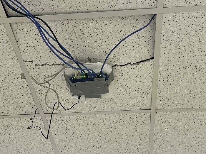 This Room At My School Doesn’t Have Ethernet Jacks, So Some Genius Decided To Disconnect The Access Point And Attach A Network Switch To The Ceiling