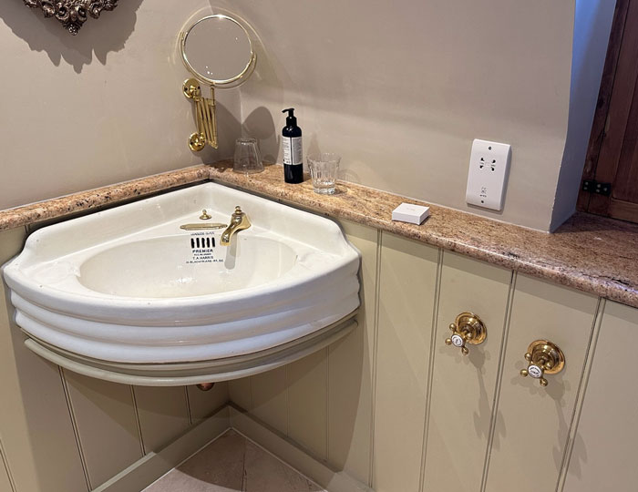 The Placement Of The Knobs For This Hotel Sink