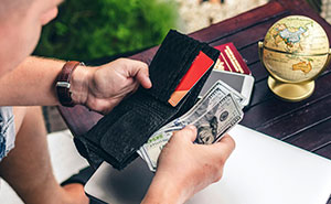 “This Is Legal Tender”: Guy Tries To Break Up $100 Bill Twice, Gets Taught A Lesson By Getting Change In Coins