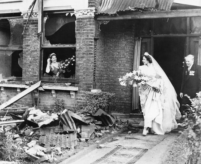 A Bride Leaving Her Recently Bombed Home To Get Married In London. November 4th, 1940