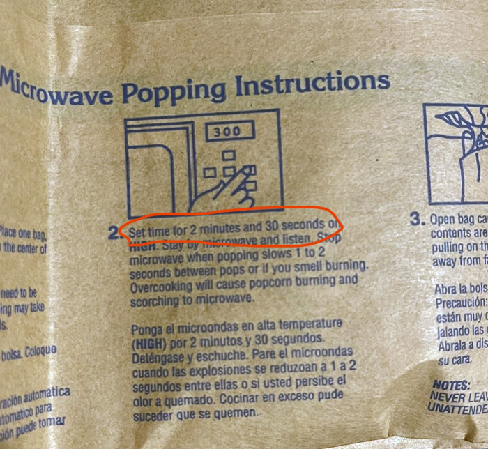 This Popcorn Bag Says Microwave For 2 Minutes, 30 Seconds, But Has A Picture Of A Microwave With 3 Minutes On It