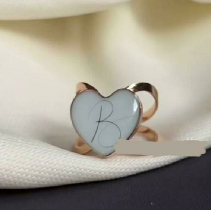 This Ring With Breast Milk And Baby's Hair In The Shape Of The First Letter Of Their Name (Reposted With Text Removed)