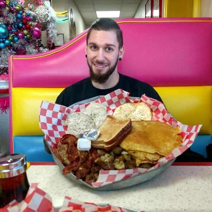 From A Local Resturaunt. A Massive Breakfast Challenge On A Garbage Can Lid