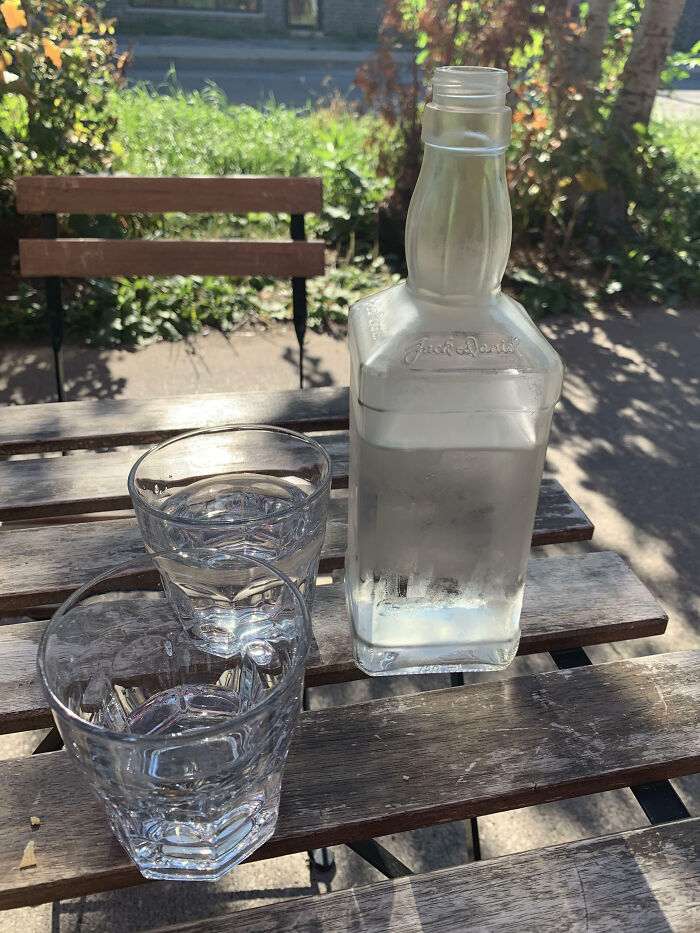 Using Old Liquor Bottles To Serve Water At Restaurants