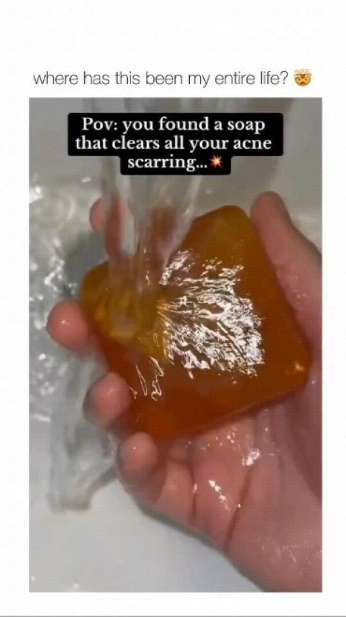 Soap meme with water pouring over an orange bar, caption about acne scarring.