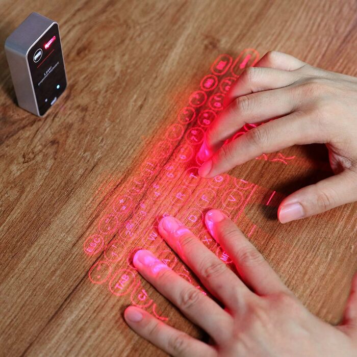 Transform Any Surface Into A Typing Space With Portable Projection Keyboard