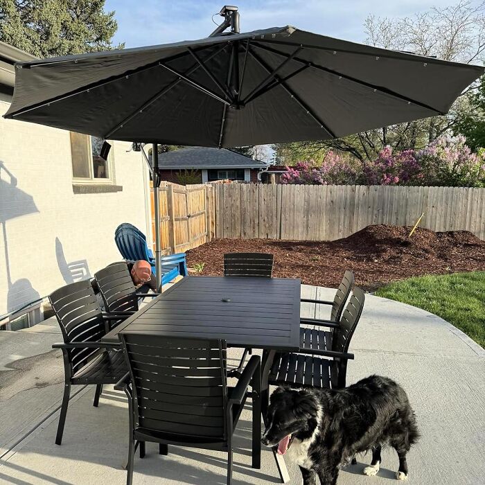 This Offset Patio Umbrella Does Away With That Pesky Pole In The Middle Of Your Conversation