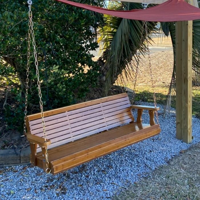 This Wooden Porch Swing Is Giving 90s Rom-Com Realness