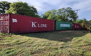 Folks Praise Woman Who Made A Whole Fence Of Shipping Containers To Ruin Entitled Neighbors’ View