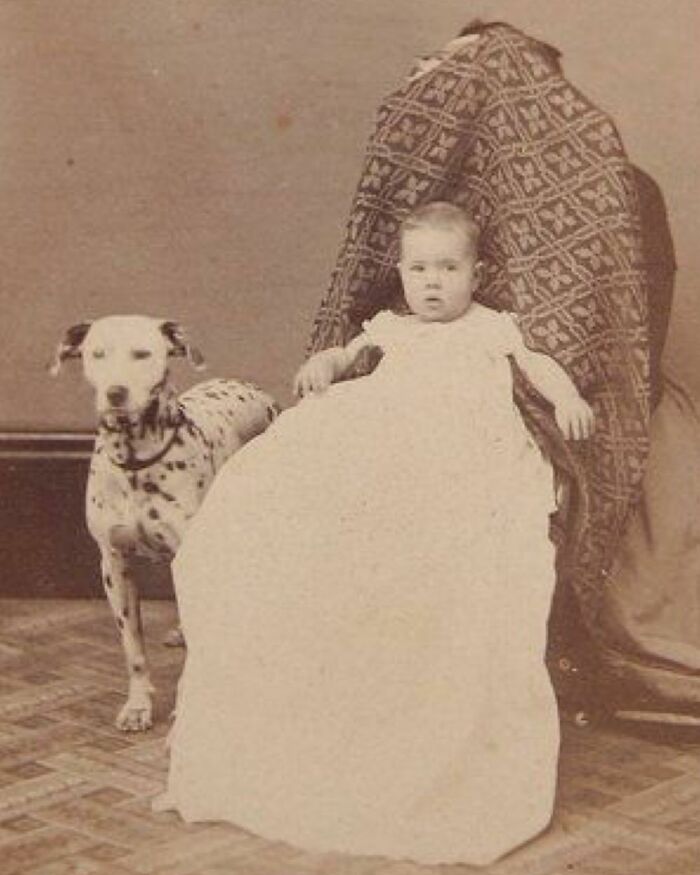 During The Victorian Era, A Style Of Photo Called “Hidden Mother” Photography Became Popular. In The Images, Mothers Hide Themselves Under A Piece Of Fabric Strategically Draped Over Their Bodies While Holding Up Their Baby