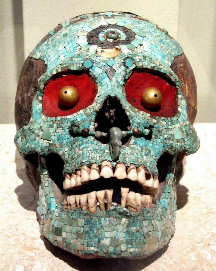 An Aztec Skull From Tonalá Covered With Turqoise Mosaic, Gold Eyes And A Jade Ornament In The Forehead. 1300-1521 Ce