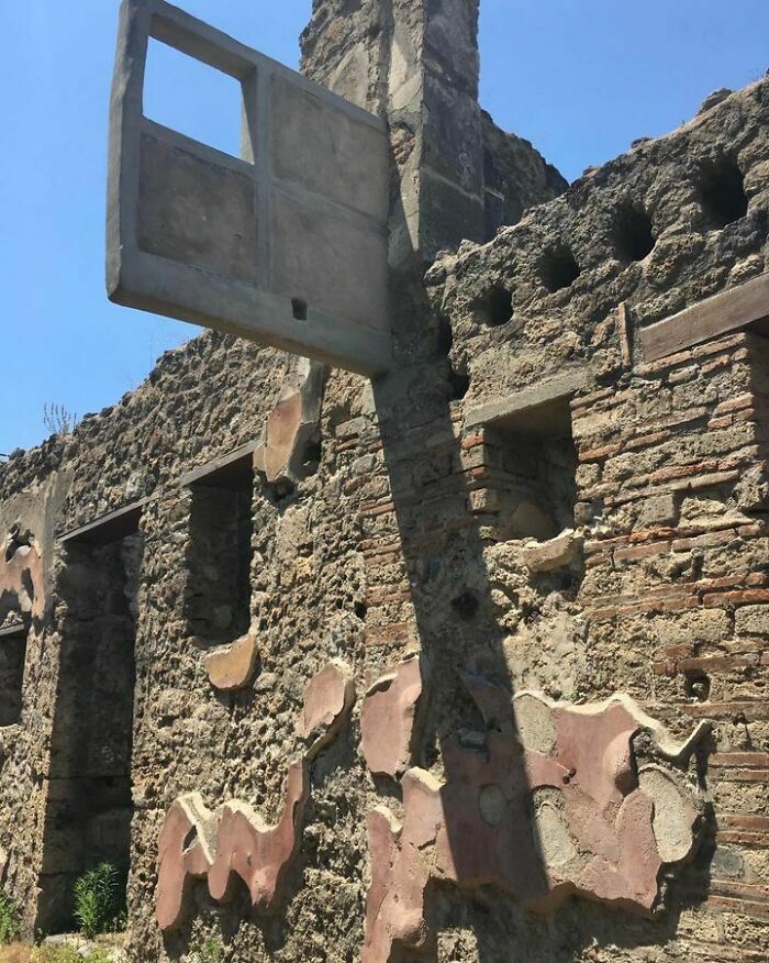 Roman "Hanging Balcony" Partially Preserved Above The Entrance Of A 1st Century Ce Tavern. The Holes At Right Once Housed Wooden Support Beams. Pompeii, Italy