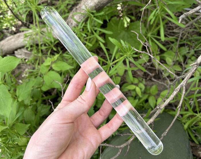 A Solid Glass Rod With Rounded Ends Found In The Woods