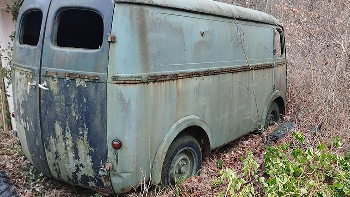 Old Van Abandoned In The Forest In France