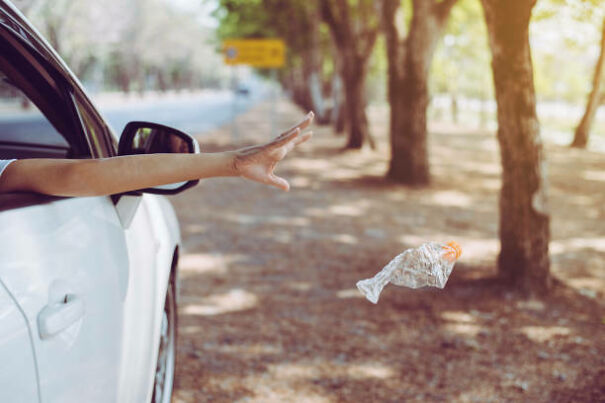 Woman Throws Cup Out Of Car Window, Is An Absolute Jerk About It