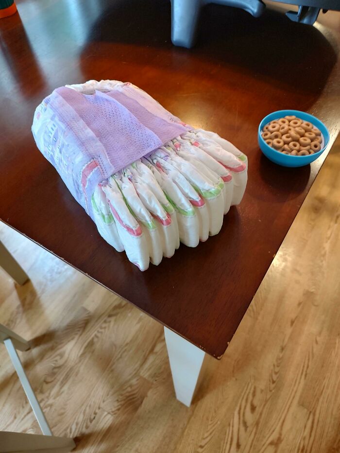 Dad Hack: Use A Diaper To Hold Your Diapers