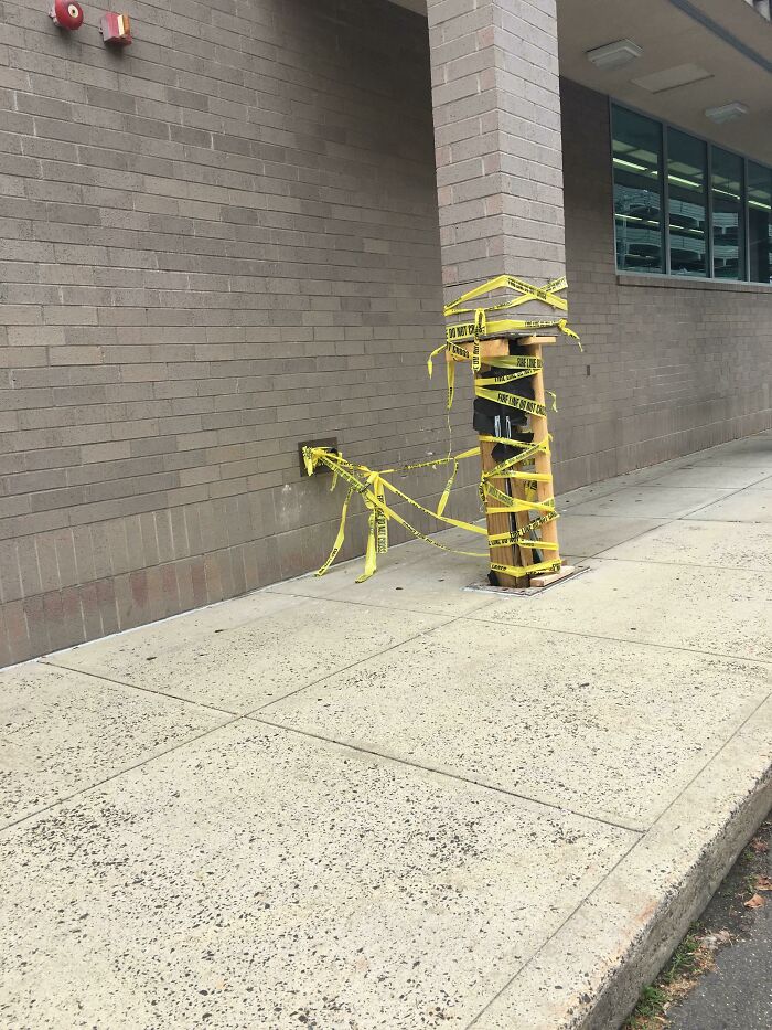 This Column At Walgreens Is Being Kept Up With Caution Tape