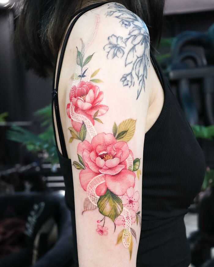 Transformative Elegance: Silo’s Exquisite Flower Tattoos And Expert Cover-UPS